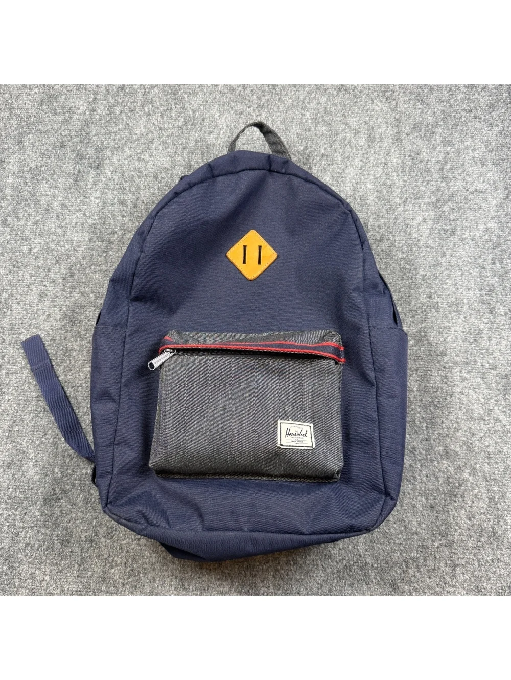 Herschel Navy Blue Backpack with Front Pocket and Red Striped Interior